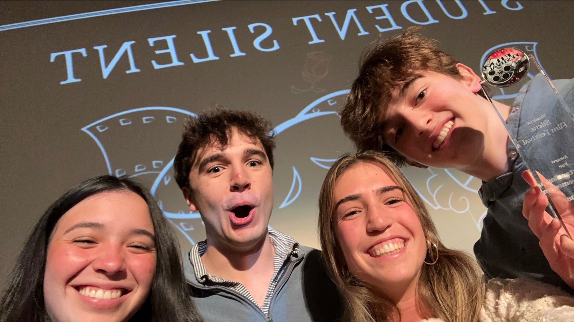 Students celebrating with award at Student Silent Film Festival