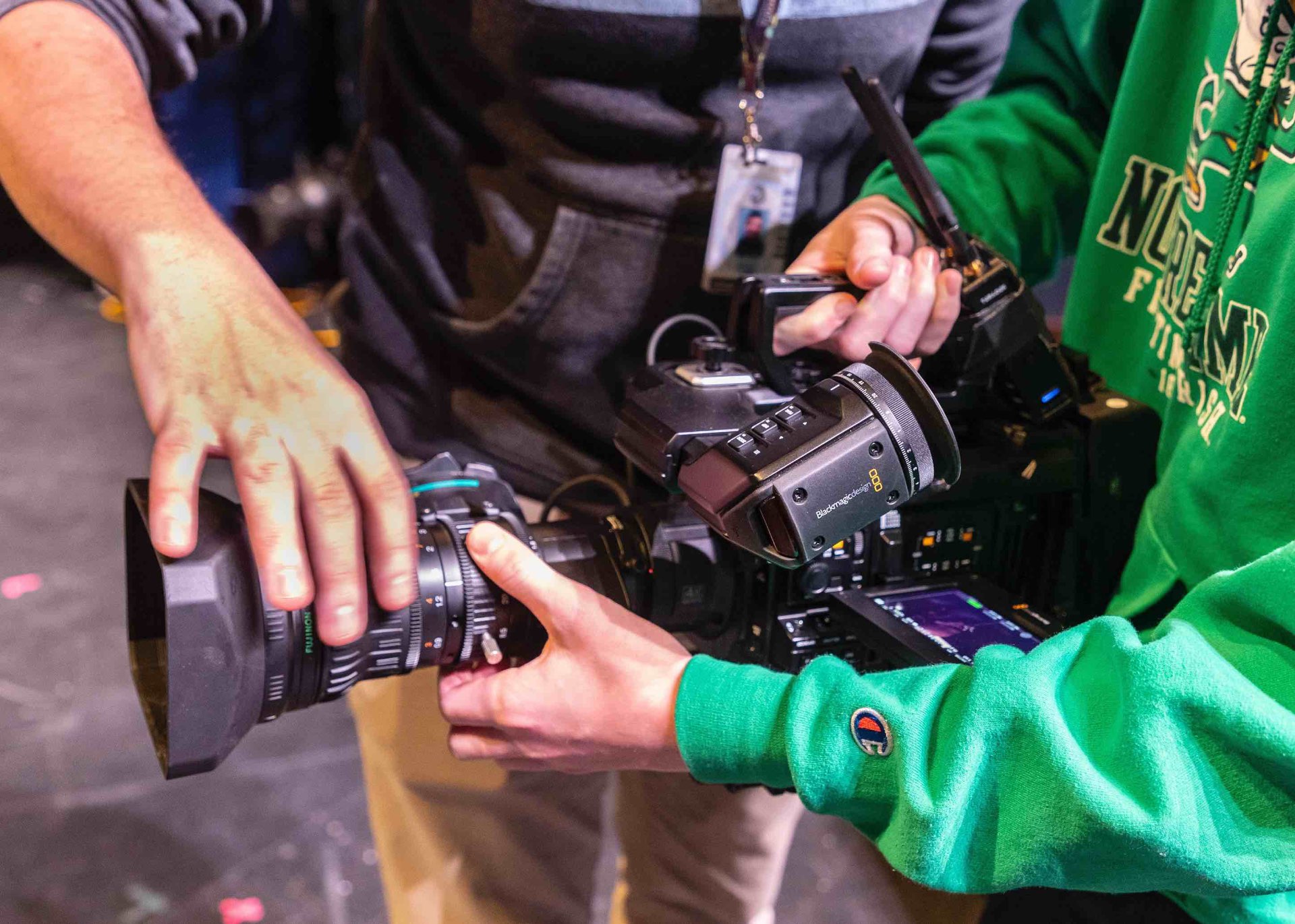 Cirina mentoring a student on a Blackmagic camera